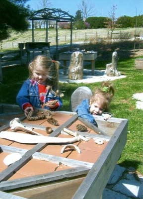 Girls making nature art